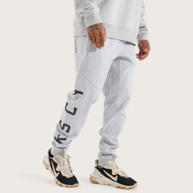 Model wears Flex Track Pant Grey Marle Pants in Grey - Image 1