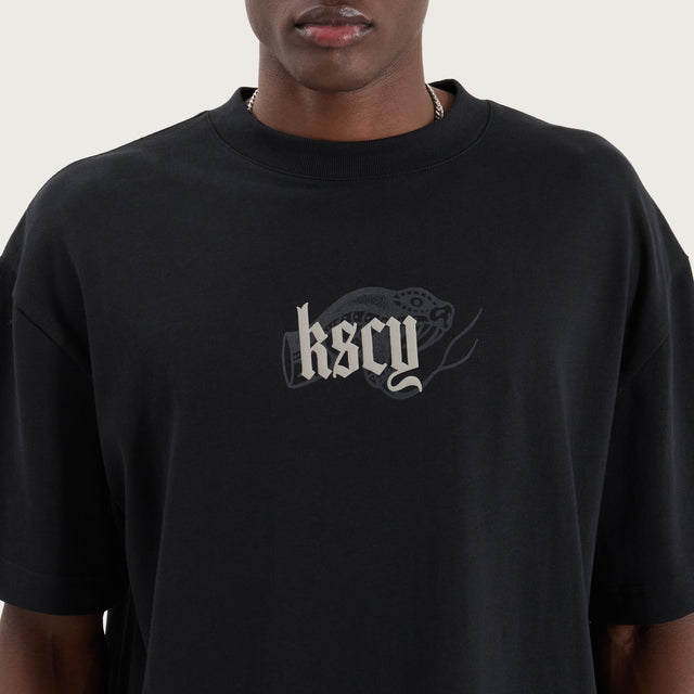 Model wears Trust Street Tee Anthracite T-Shirts in Black - Image 4