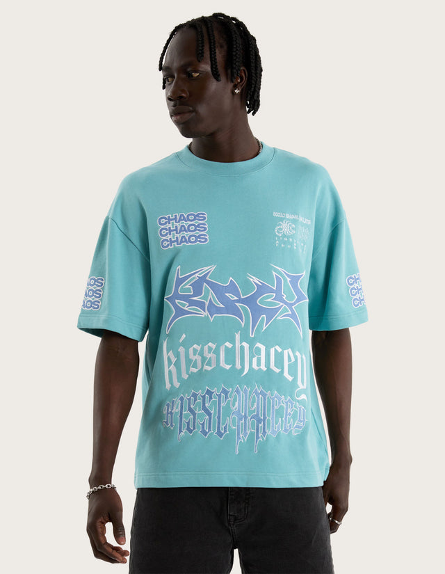 Model wears Posse Loopback Street Tee Teal T-Shirts in Green - Image 7