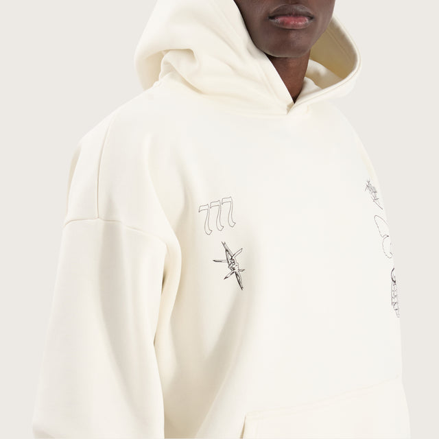 Model wears Redback Oversized Hoodie Tofu Hoodies in Off-White - Image 5