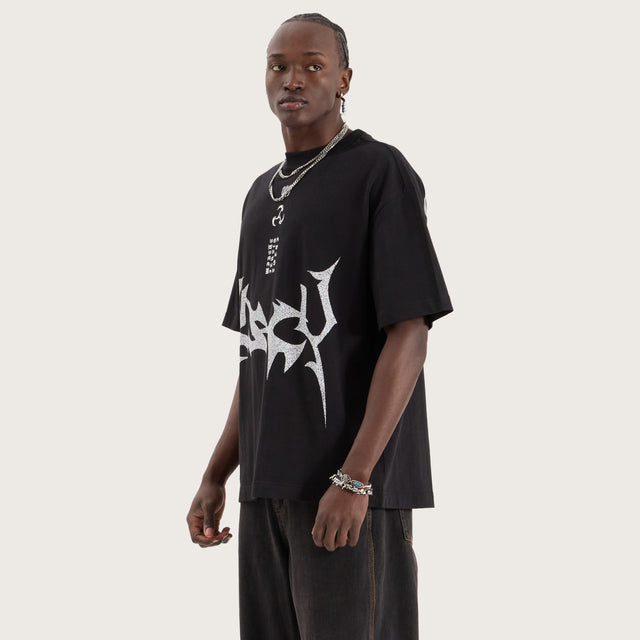 Model wears Gothica Street Tee Jet Black T-Shirts in Black - Image 4