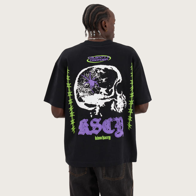 Model wears Disorder Street Tee Anthracite T-Shirts in Black - Image 1