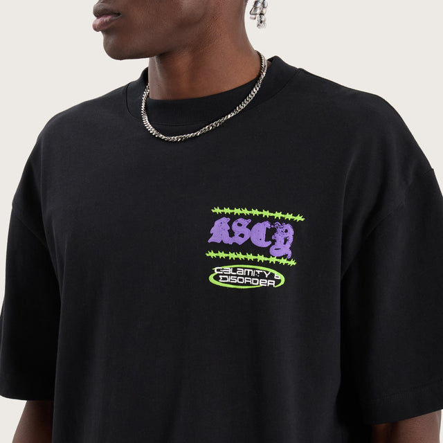 Model wears Disorder Street Tee Anthracite T-Shirts in Black - Image 5