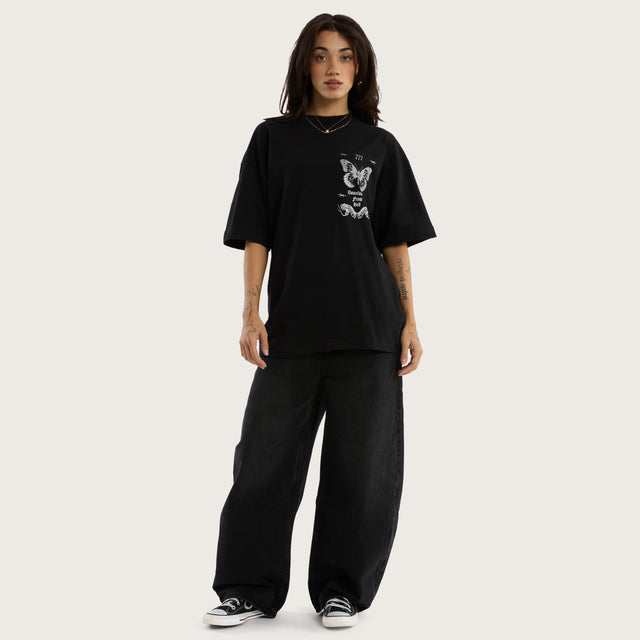 Model wears Download Street Tee Jet Black T-Shirts in Black - Image 7