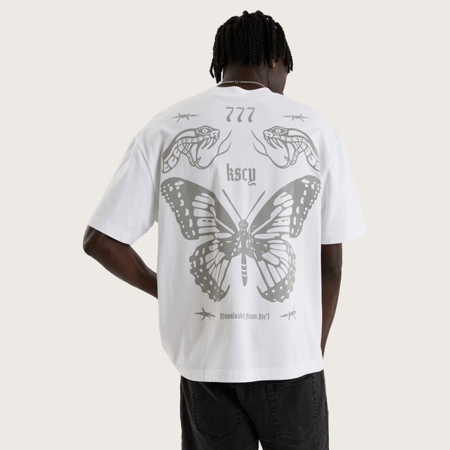 Model wears Download Street Tee White T-Shirts in White - Image 1