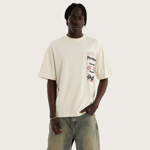 Model wears Firebreather Street Tee Tofu T-Shirts in Off-White - Image 5