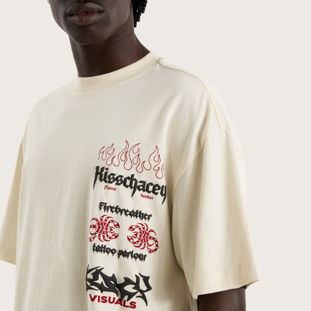 Model wears Firebreather Street Tee Tofu T-Shirts in Off-White - Image 2