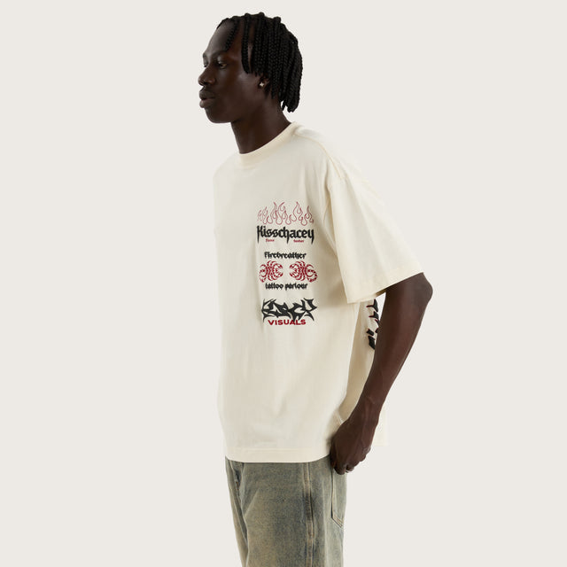 Model wears Firebreather Street Tee Tofu T-Shirts in Off-White - Image 3