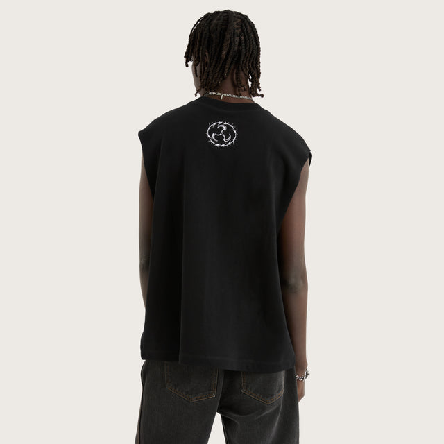 Model wears System Loopback Mechanic Muscle Black Muscle Tees in Black - Image 3