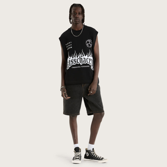 Model wears System Loopback Mechanic Muscle Black Muscle Tees in Black - Image 4
