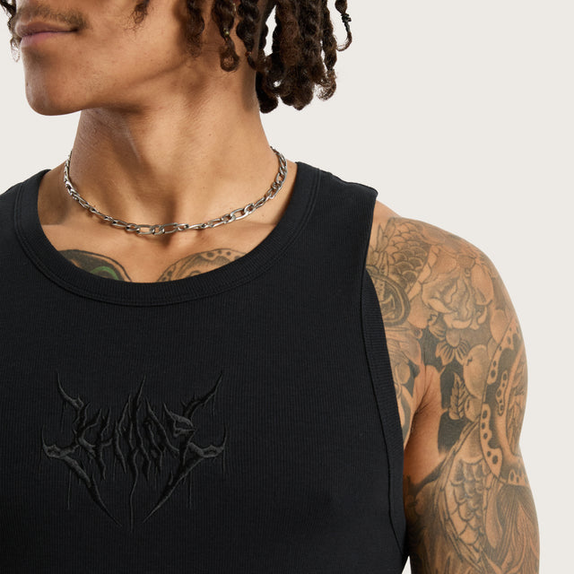 Model wears Chaos Singlet Anthracite Black Tanks in Black - Image 2