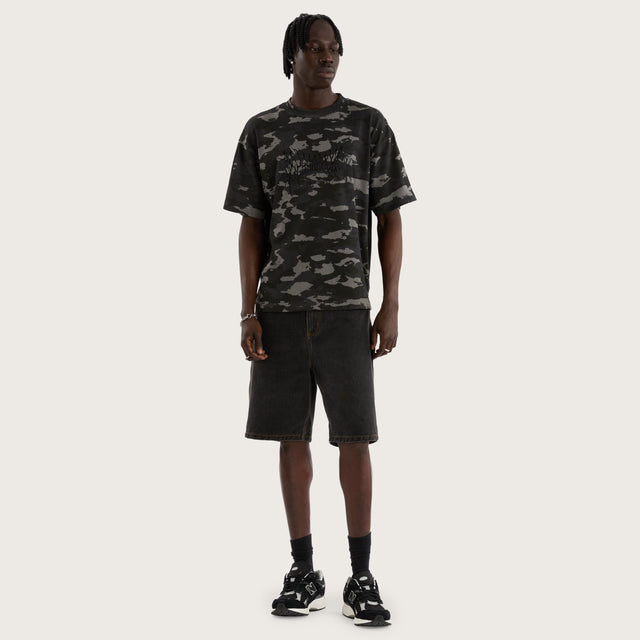 Model wears Camo Street Tee Camo Black T-Shirts in Camo - Image 4