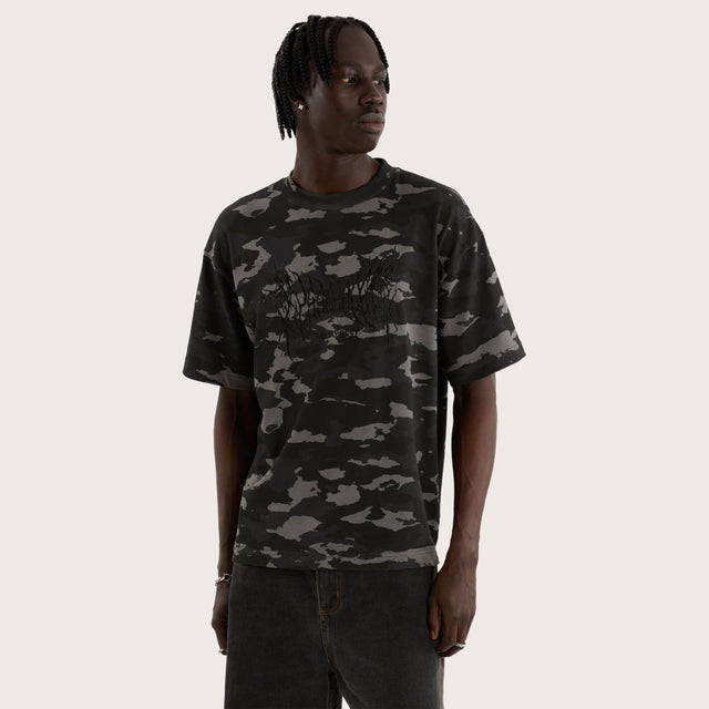 Model wears Camo Street Tee Camo Black T-Shirts in Camo - Image 1