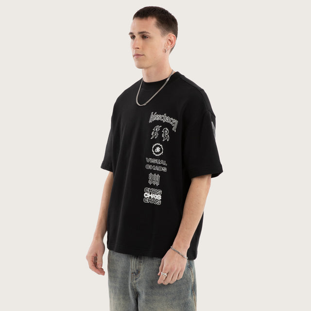 Model wears Gates Street Tee Jet Black T-Shirts in Black - Image 5