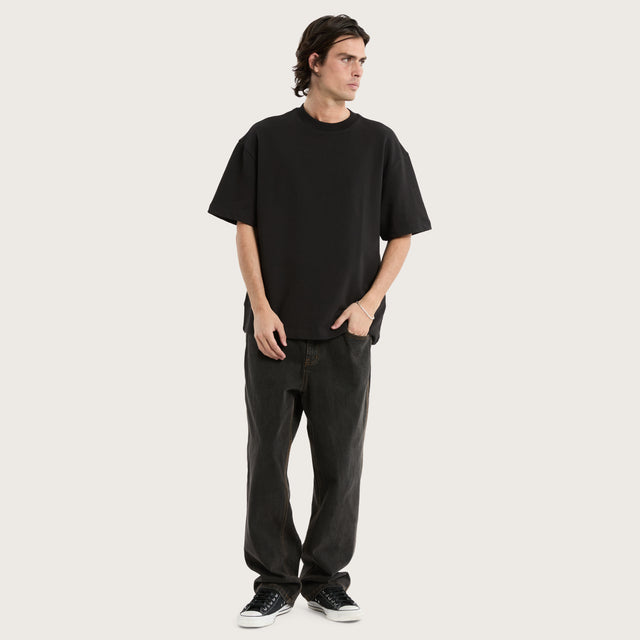 Model wears Cassius Loopback Street Tee Jet Black T-Shirts in Black - Image 2