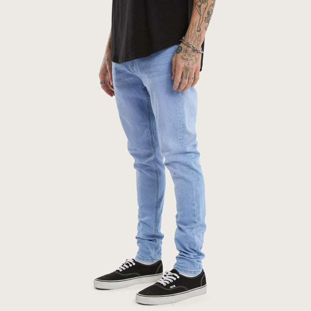 Model wears K1 Super Skinny Fit Jeans Ultimate Blue Pants in Blue - Image 1
