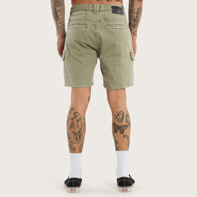 Model wears Salem Cargo Short Vintage Khaki Shorts in Green - Image 5