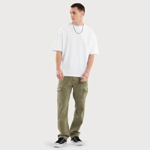 Model wears Seattle Cargo Pant Khaki Pants in Green - Image 2