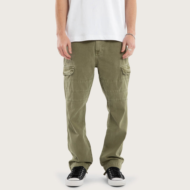 Model wears Seattle Cargo Pant Khaki Pants in Green - Image 6