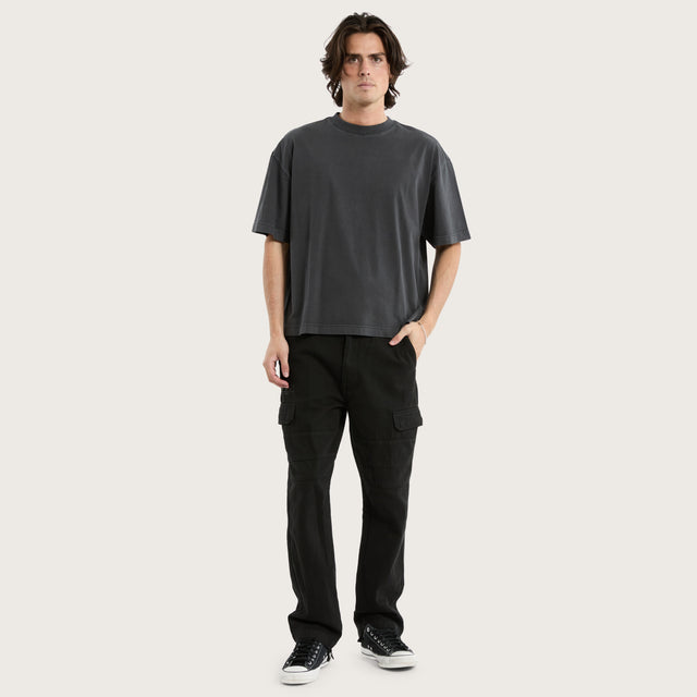 Model wears Seattle Cargo Pant Black Pants in Black - Image 2