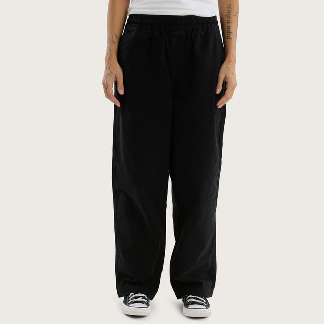 Model wears Diablo Baggy Pant Jet Black Pants in Black - Image 5