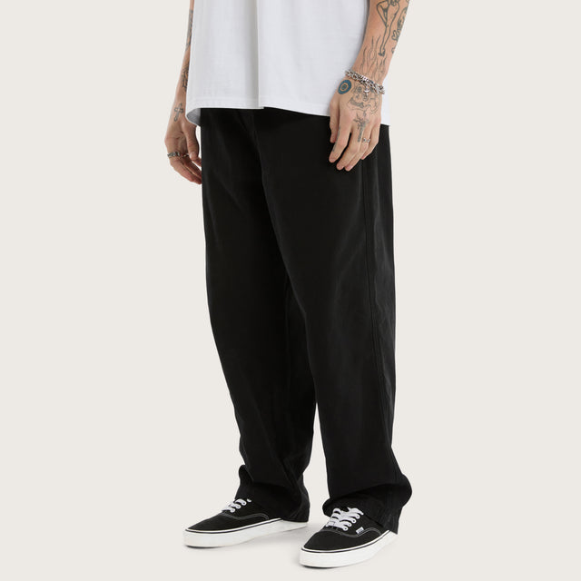 Model wears Diablo Baggy Pant Jet Black Pants in Black - Image 2