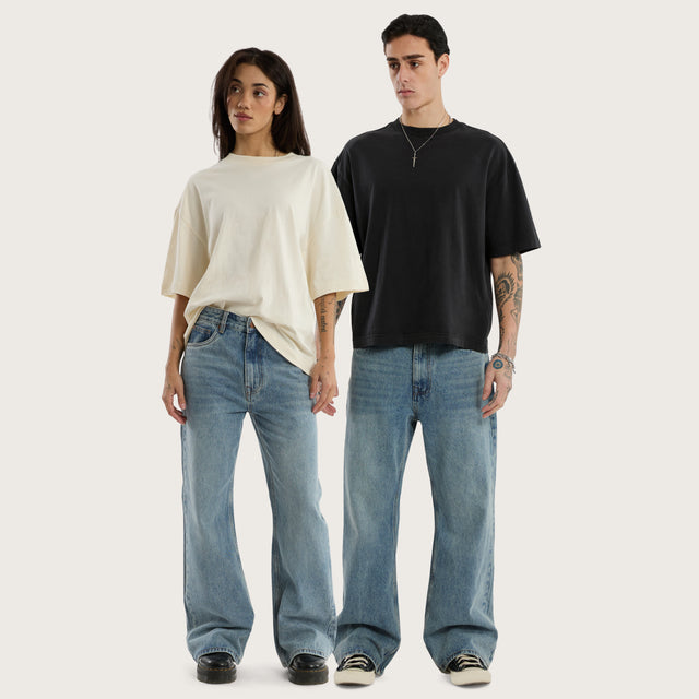 Model wears Wilder Bootcut Jean Baja Blue Pants in Blue - Image 2