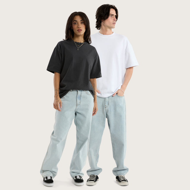 Model wears K6 Baggy Wide Leg Jean Light Blue Pants in Blue - Image 1