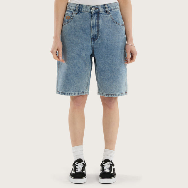 Model wears K6 Denim Jort Trashed Blue Shorts in 0 - Image 7