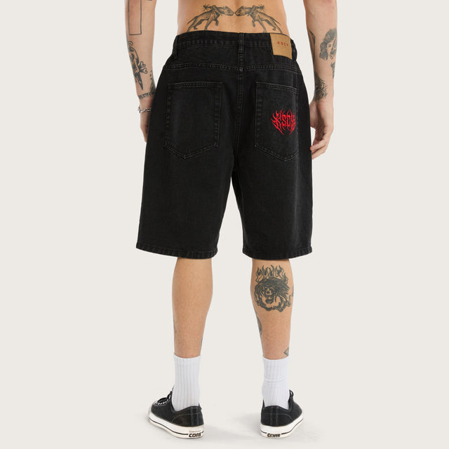 Model wears K6 Denim Jort Worn Black Shorts in Black - Image 2