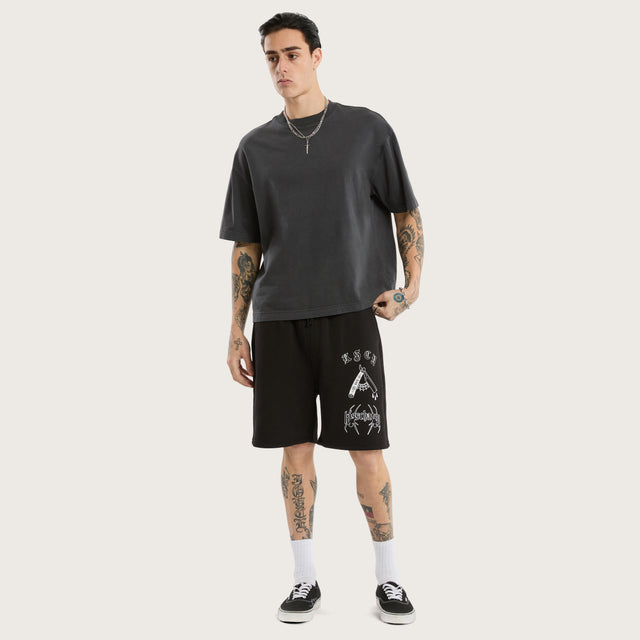 Model wears Close Shave Trackshort Jet Black Trackshorts in Black - Image 2