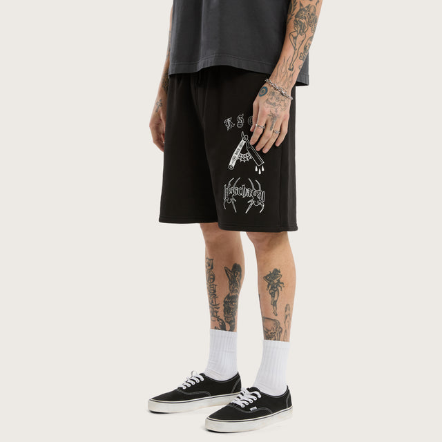 Model wears Close Shave Trackshort Jet Black Trackshorts in Black - Image 1