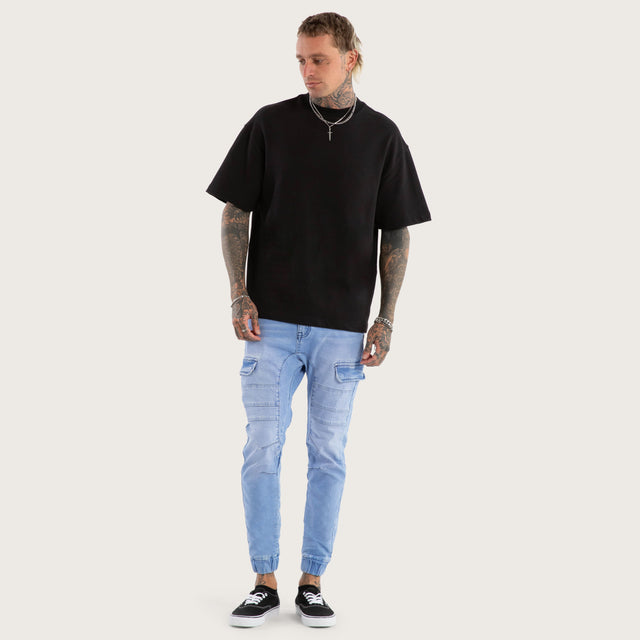 Model wears Salem Cargo Jogger Crystal Blue Pants in Blue - Image 2