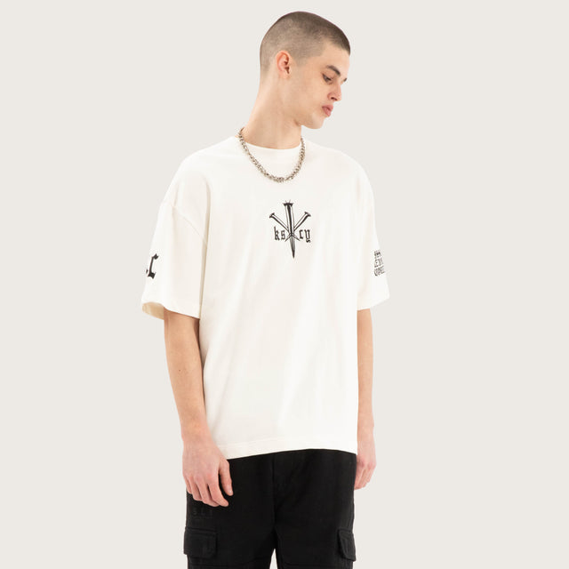 Model wears Revolation Loopback Street Tee Natural White T-Shirts in White - Image 4
