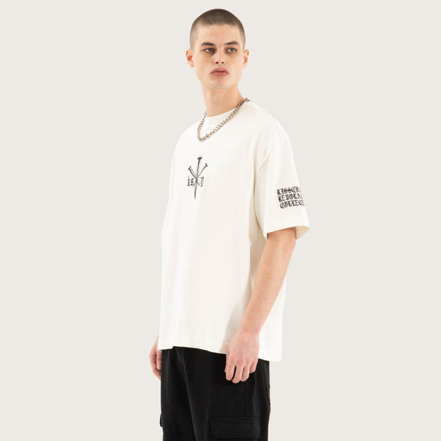 Model wears Revolation Loopback Street Tee Natural White T-Shirts in White - Image 5