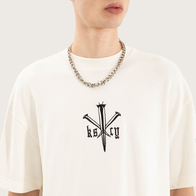 Model wears Revolation Loopback Street Tee Natural White T-Shirts in White - Image 2
