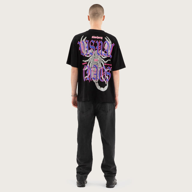 Model wears Scorpio Street Tee Jet Black T-Shirts in Black - Image 7