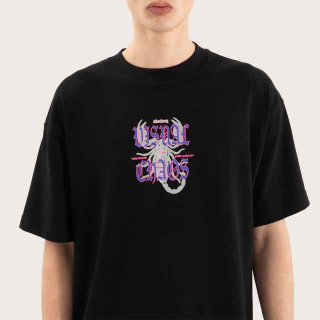 Model wears Scorpio Street Tee Jet Black T-Shirts in Black - Image 5