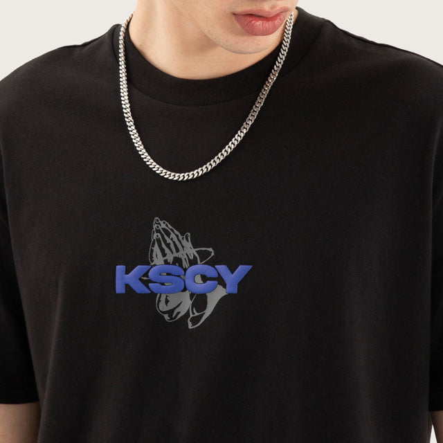 Model wears Fleeting Relaxed Tee Jet Black T-Shirts in Black - Image 3