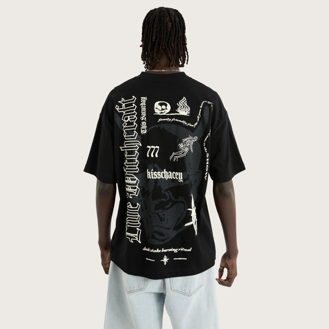 Model wears Witchcraft Blacked Out Street Tee Jet Black T-Shirts in Black - Image 1