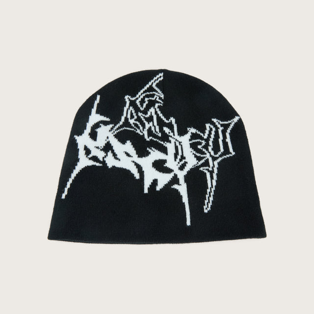 Model wears Obsidian Beanie Jet Black Headwear in Black - Image 1