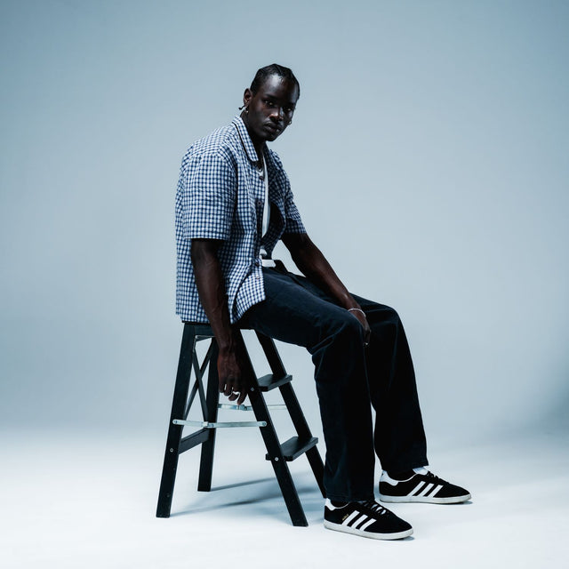 Model wears Skylar Oversized Dress Shirt Blue Check Short Sleeve Shirts in Blue - Image 2