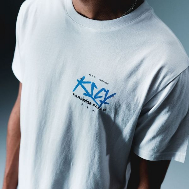 Model wears Luxor Dual Curved Tee Optical White T-Shirts in White - Image 2