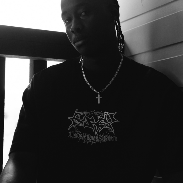 Model wears Wire Street Tee Jet Black T-Shirts in Black - Image 2