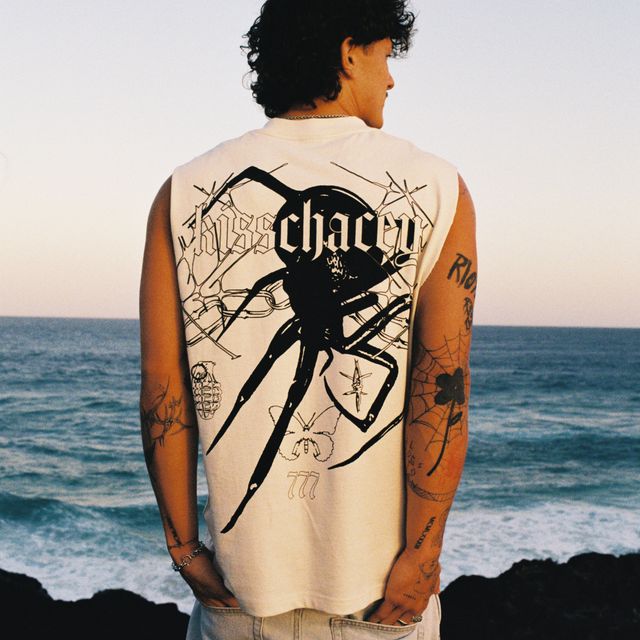 Model wears Redback Street Muscle Tofu Muscle Tees in Off-White - Image 2