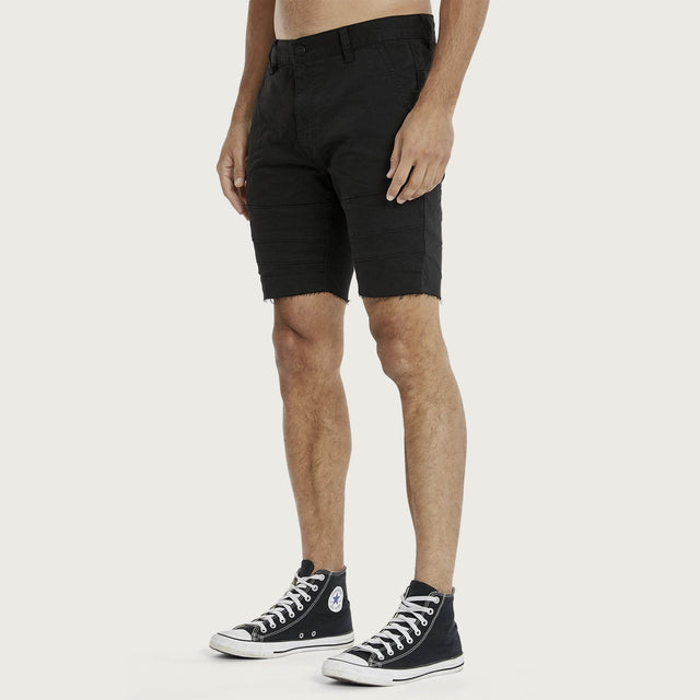 Model wears Arcadia Short Jet Black Shorts in Black - Image 5