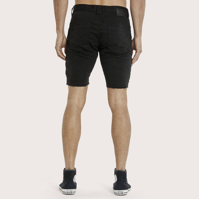 Model wears Arcadia Short Jet Black Shorts in Black - Image 3