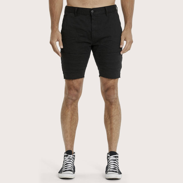 Model wears Arcadia Short Jet Black Shorts in Black - Image 4