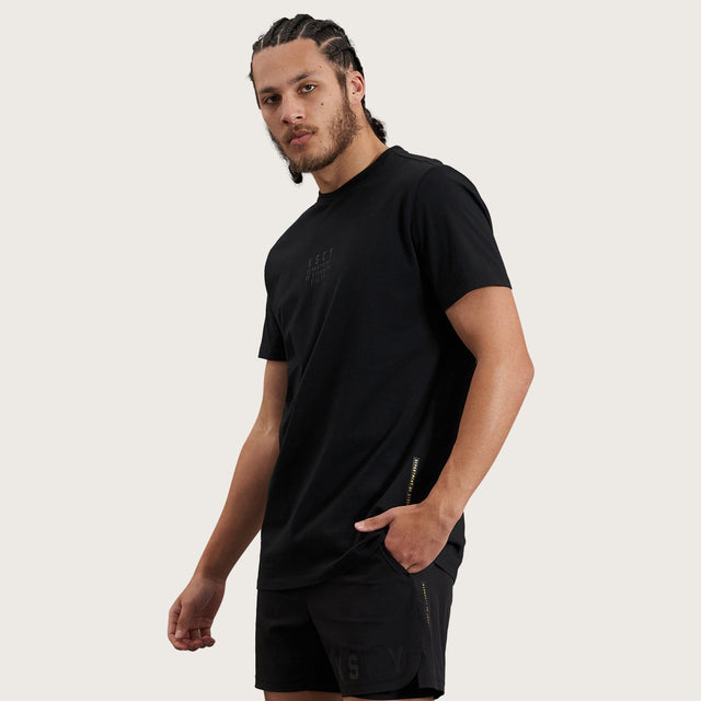 Model wears Balance Active T-Shirt Jet Black T-Shirts in Black - Image 3