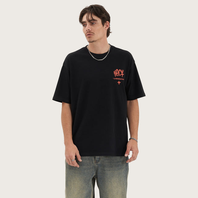 Model wears Blessing Heavy Box Fit Tee Jet Black T-Shirts in Black - Image 2